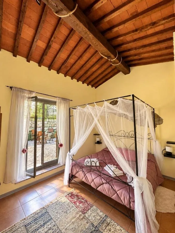 Camera Madame Deluxe con letto a baldacchino e patio